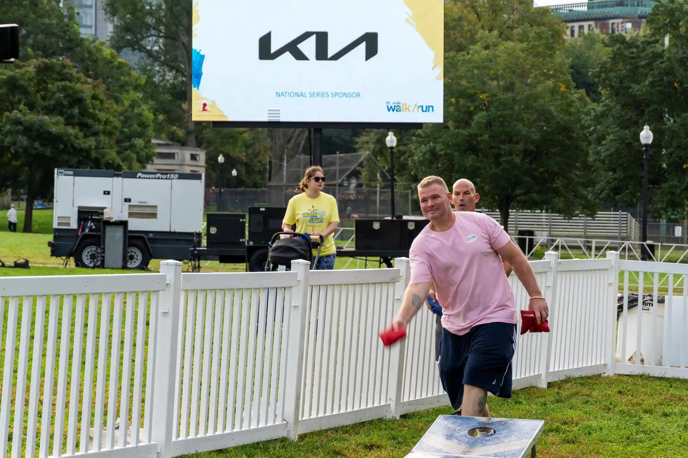 Clancy Brothers team at the bean bag toss during the St. Jude fundraising event