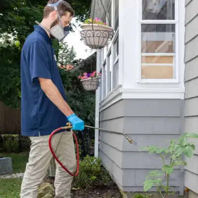 https://www.clancybrospestcontrol.com/public_files/clancybrospestcontrol-s3-live/styles/body_400x400/public/images/pest-control-tech-spraying-exterior-home.webp?h=2a479378&itok=NJpaqFth&utm_source=chatgpt.com