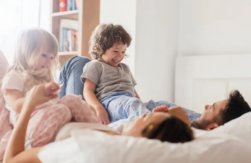 family in bed